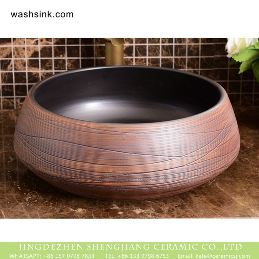 XHTC-X-1050-1 Shengjiang factory wholesale price Chinoiserie antique style art ceramic basin with smooth black wall and carved irregular lines on rosewood grain glaze surface XHTC-X-1050-1 - shengjiang  ceramic  factory   porcelain art hand basin wash sink