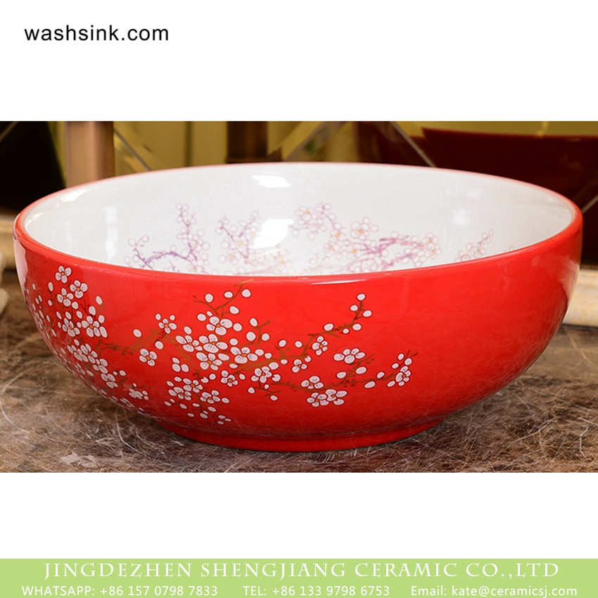 XHTC-X-1054-1 Wintersweet Series Elegant single hole Shengjiang factory direct Japanese artistic vintage oval ceramic wash basin with little scattered plum blossom pattern on white glaze wall and red glaze surface XHTC-X-1054-1 - shengjiang  ceramic  factory   porcelain art hand basin wash sink