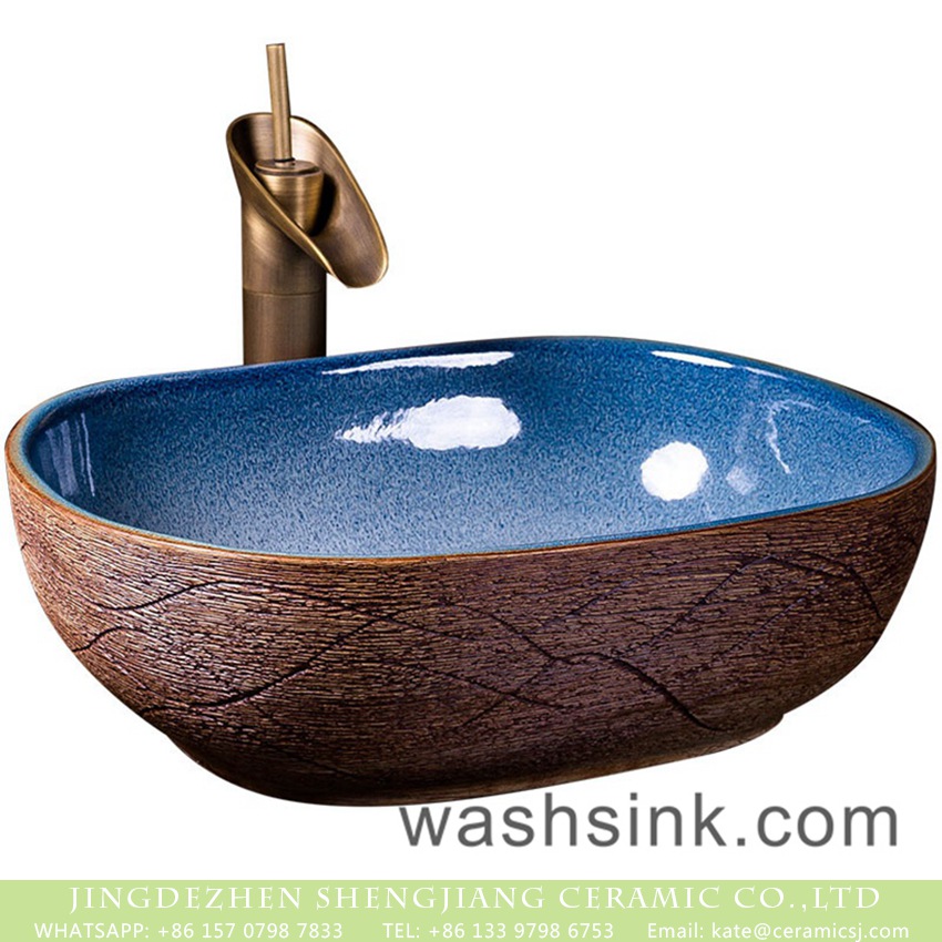 XXDD-36-3 Jingdezhen Chinese antique retro style ceramic countertop sink with high gloss light blue wall and carved big wave stripes on imitating wood surface XXDD-36-3 - shengjiang  ceramic  factory   porcelain art hand basin wash sink