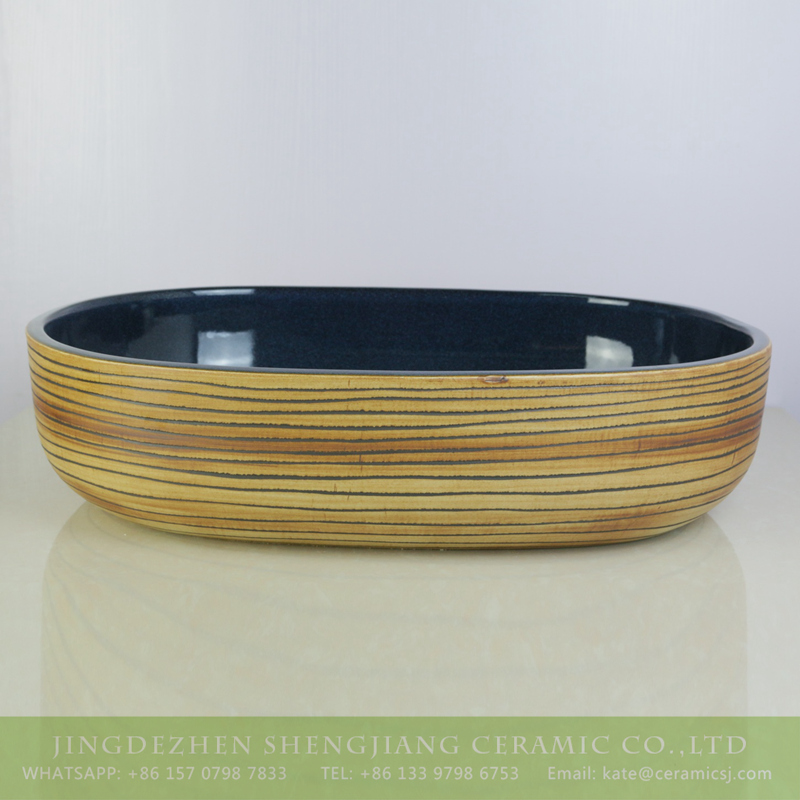 sjbyl-6007-（大椭圆）花釉铁红平行线 sjbyl-6007  Wood color with hand carved stripe oval durable basin - shengjiang  ceramic  factory   porcelain art hand basin wash sink