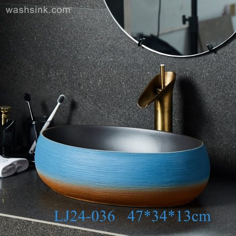 LJ24-0036  Small and delicate goose egg shape orange blue with black inner wall bathroom sink