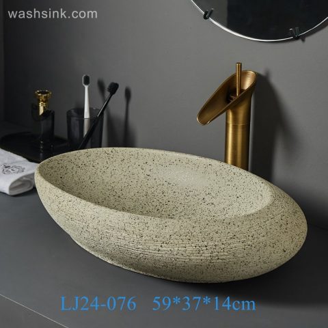 LJ24-0076 2024 New design yellow sand grain appearance decorative pebble shape ceramic wash basin