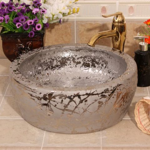 Silver and golden Ceramic washbasins