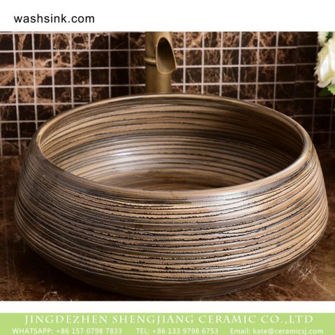 Chinese quaint antique style high quality round original domestic bathroom ceramic wash basin featuring sculptured brown wood grain pattern XHTC-X-1037-1