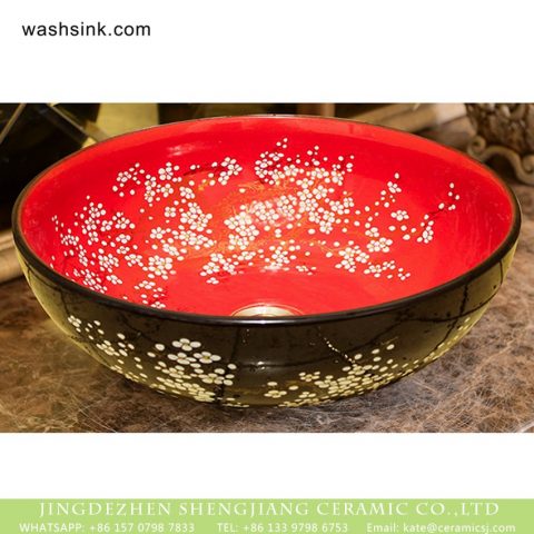 Wintersweet Series Elegant Jingdezhen Jiangxi factory direct Japanese style art retro round bathroom sink with little plum blossom pattern on red glaze wall and black surface XHTC-X-1056-1