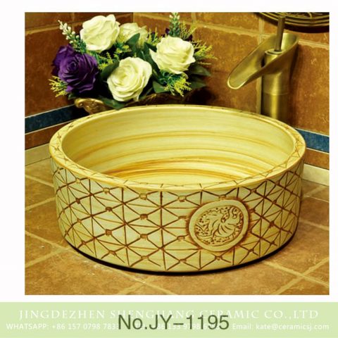 Shengjiang factory direct wood color ceramic and hand carved unique pattern surface wash sink    SJJY-1195-27