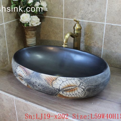 LJ19-x202        Round hand carved butterfly design ceramic wash sink